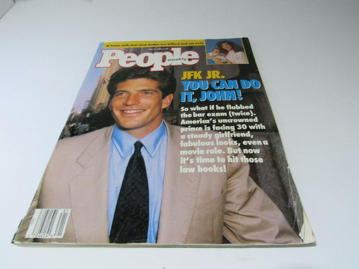 Vintage People Magazine cover from May 21, 1990 featuring JFK Jr. with the headline 'You Can Do It, John!' The cover discusses his challenges flunking the bar exam, while highlighting his status as America's uncrowned prince at age 30, with insights into his personal life.