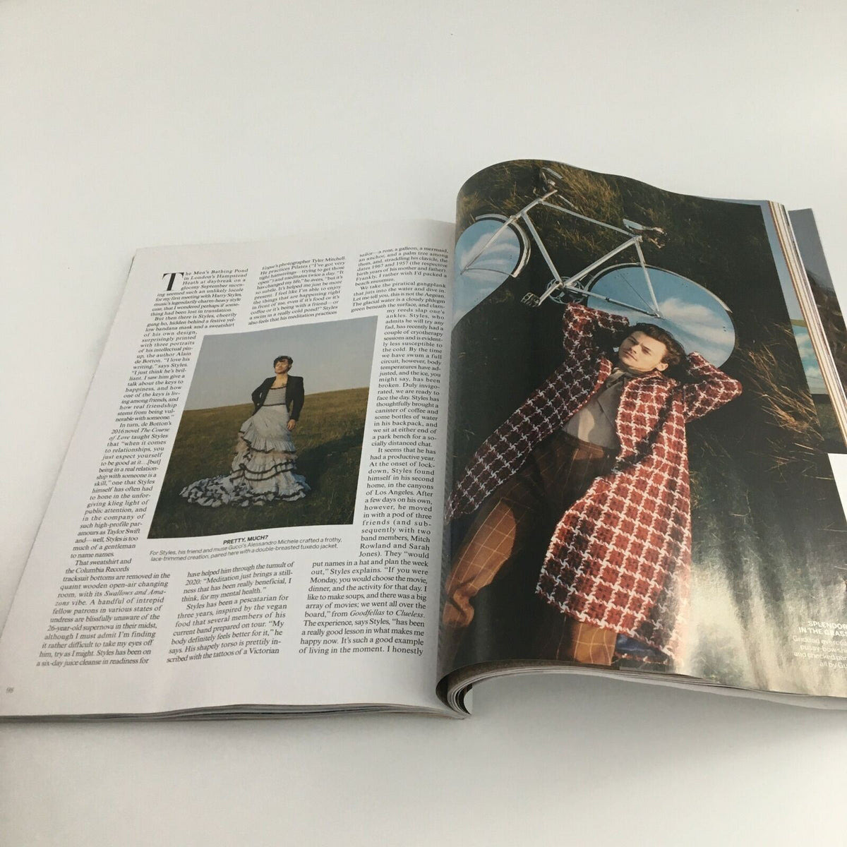 Vogue Magazine December 2020 Harry Styles in Playtime Cover Feature, featuring a stylish photo of a model wearing a chic outfit with a bicycle in the background.