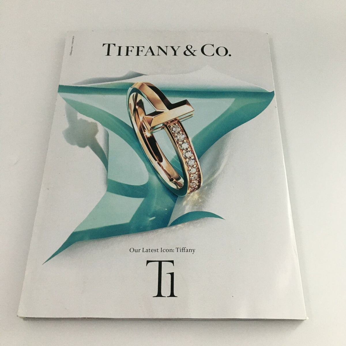 Vogue Magazine December 2020 Harry Styles in Playtime Cover Feature, displaying a Tiffany & Co. advertisement showcasing a stunning ring design.