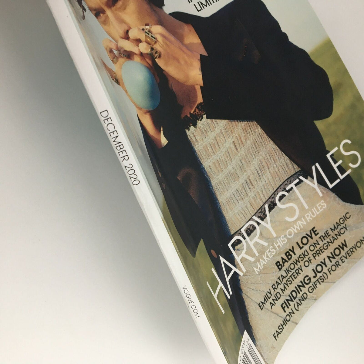 Vogue Magazine December 2020 Harry Styles in Playtime Cover Feature, highlighting the magazine's spine with the title and issue date clearly visible.