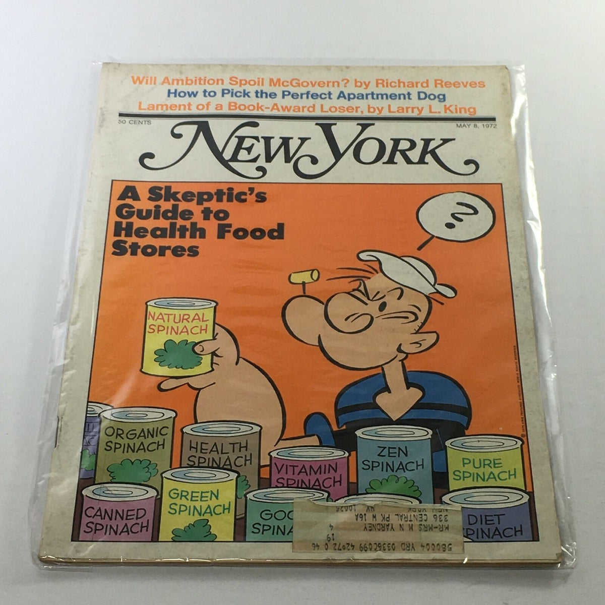 Cover of New York Magazine dated May 8, 1972, featuring the title 'A Skeptic's Guide to Health Food Stores' alongside an illustration of a character holding a can labeled 'Natural Spinach' amidst various spinach products.