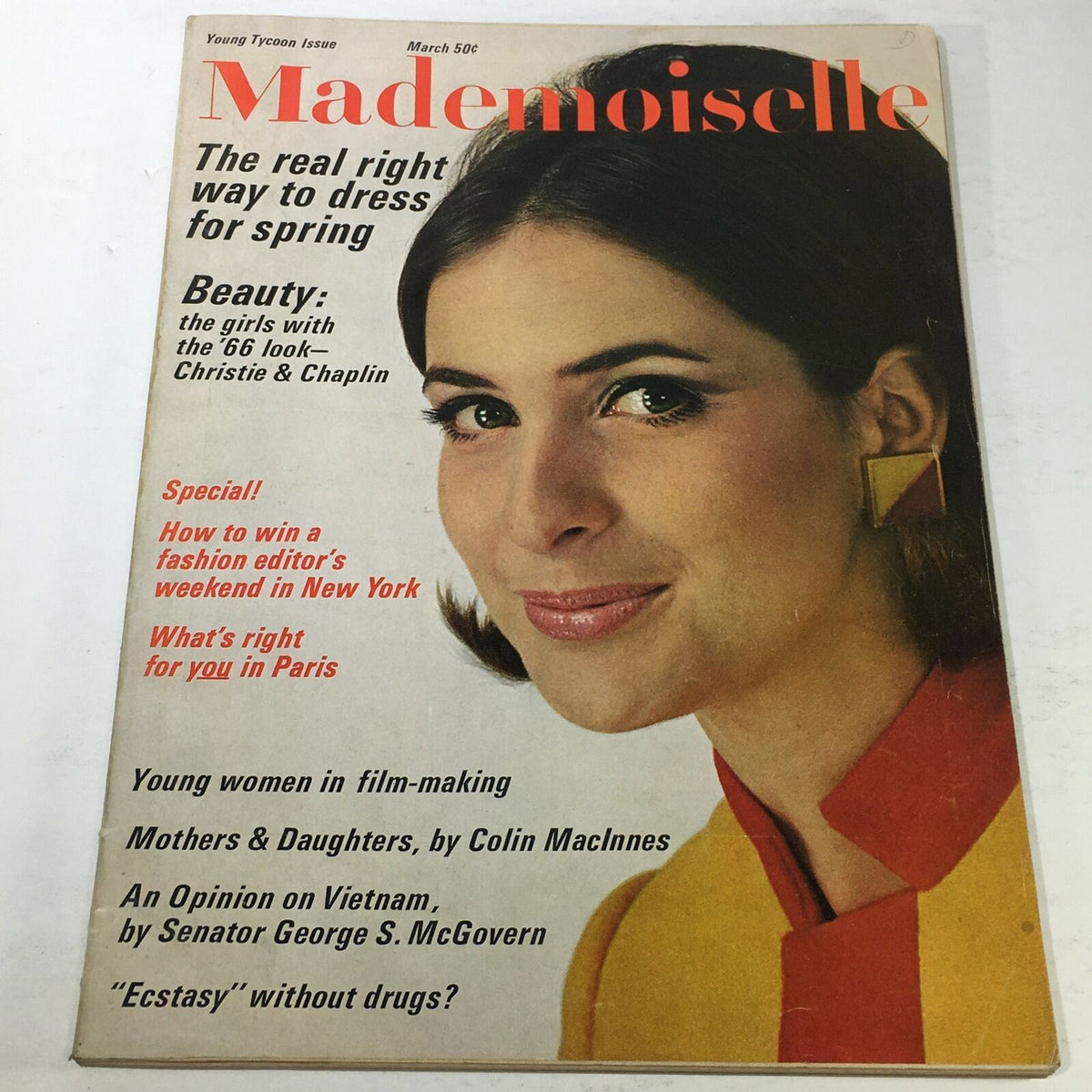 VTG Mademoiselle Magazine from March 1966, The Young Tycoon Issue cover featuring a model with a stylish hairstyle and colorful outfit, highlighting fashion and lifestyle trends of the 1960s.