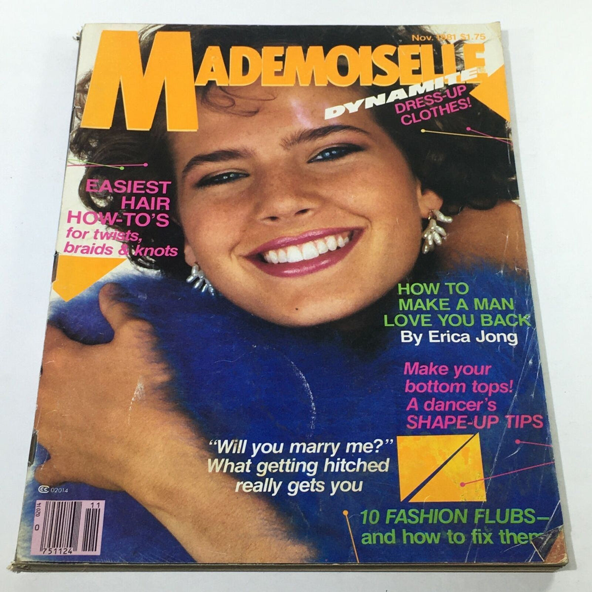 Vintage Mademoiselle Magazine cover from November 1981 featuring a smiling model with curly hair, promoting beauty tips and fashion insights.