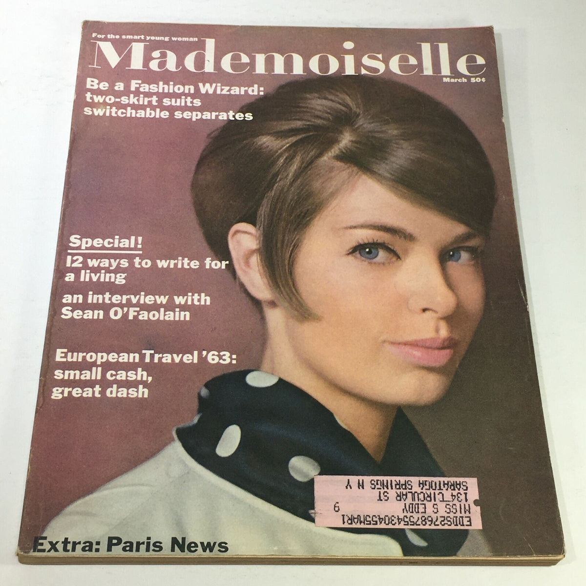 Cover of VTG Mademoiselle Magazine: March 1963 featuring a vintage fashion model with a stylish haircut, promoting an interview with Sean O'Faolain and fashion insights.