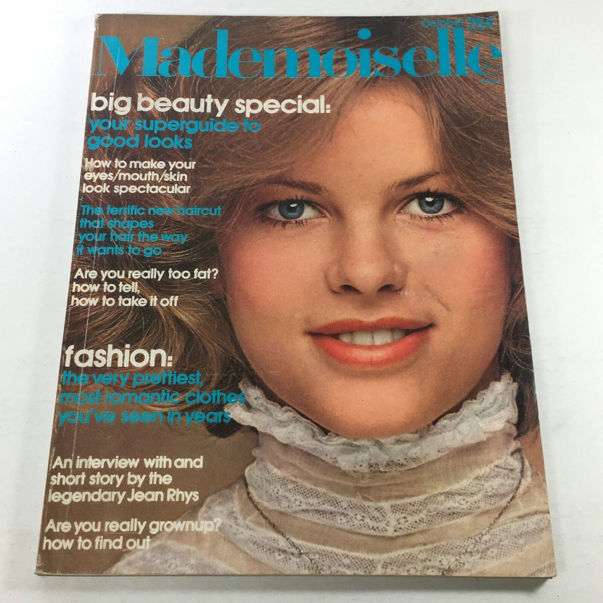 VTG Mademoiselle Magazine Cover - October 1974 featuring a beauty special, romantic fashion highlights, and a close-up of a model with long hair, showcasing 70s aesthetics.