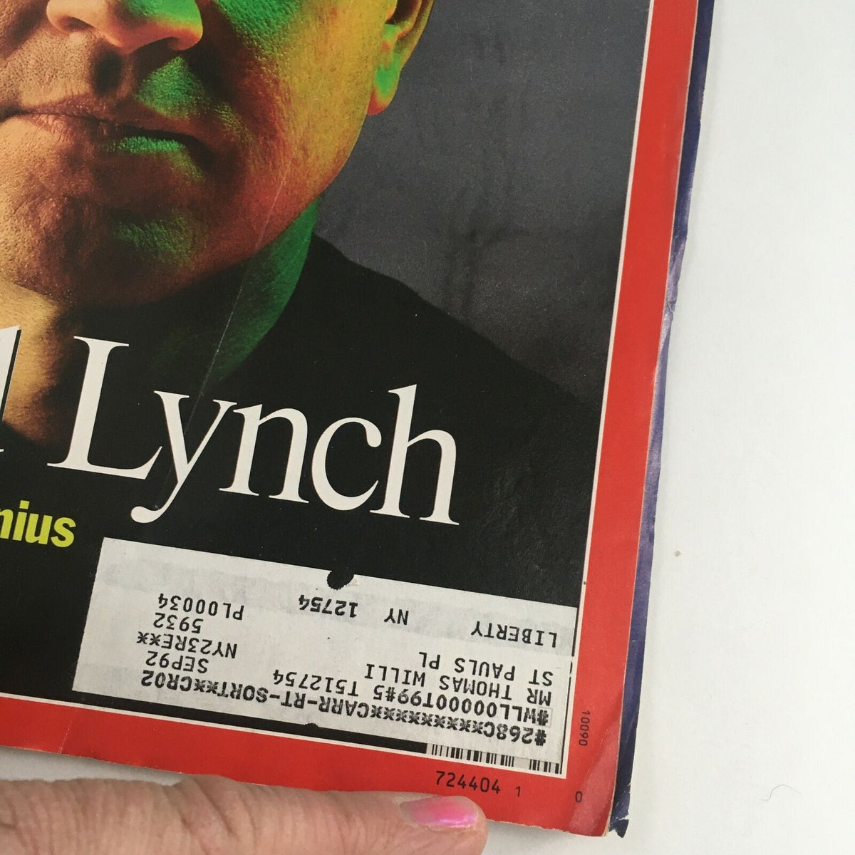 Close-up of Time Magazine’s cover from October 1, 1990, showcasing David Lynch with a library check-out label.