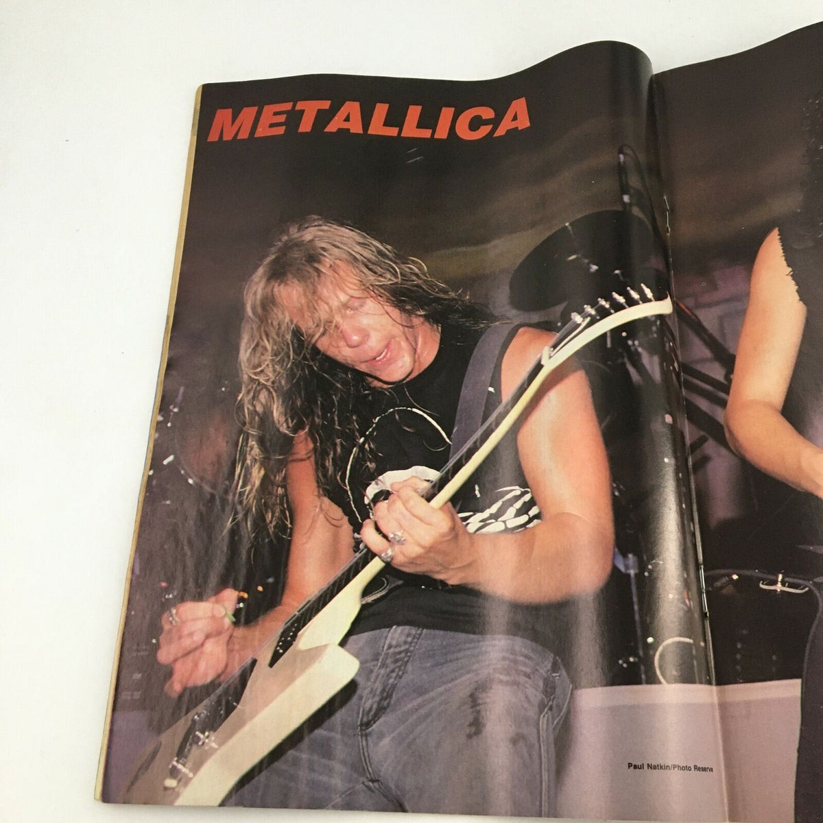 Interior page of Creem Thrash Metal Magazine November 1987 showcasing Metallica, featuring a live performance photograph of a band member playing guitar, reflecting the thrash metal scene.
