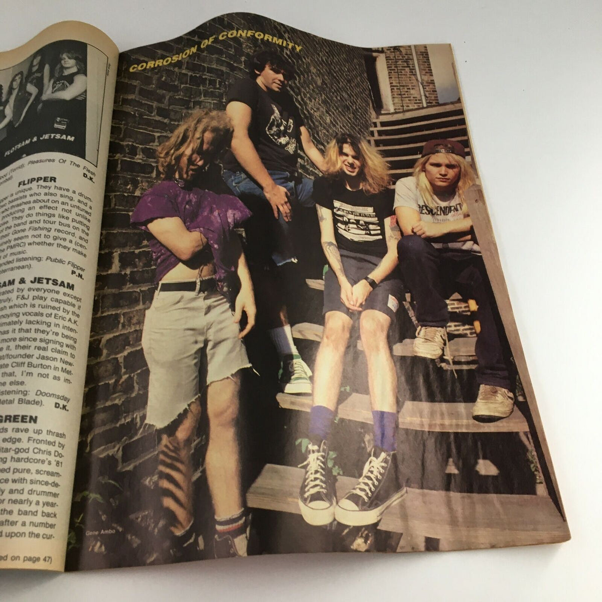 Image from Creem Thrash Metal Magazine November 1987 featuring the band Corrosion of Conformity posing on outdoor steps, showcasing the gritty vibe of the thrash metal scene.