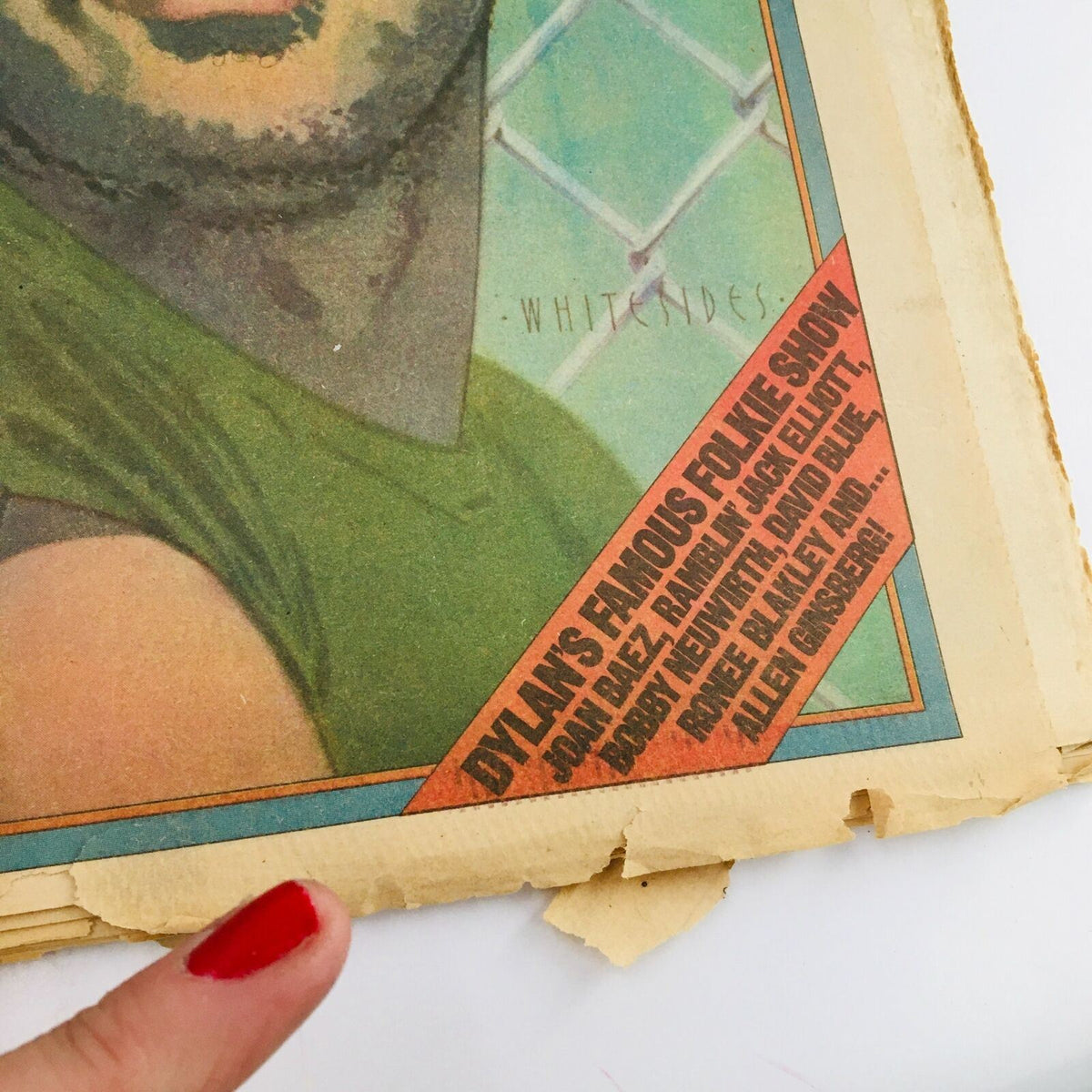 Detail of the Rolling Stone Magazine December 4, 1975 featuring an article snippet about Bob Dylan's concert, emphasizing the vintage appeal of issue #201.