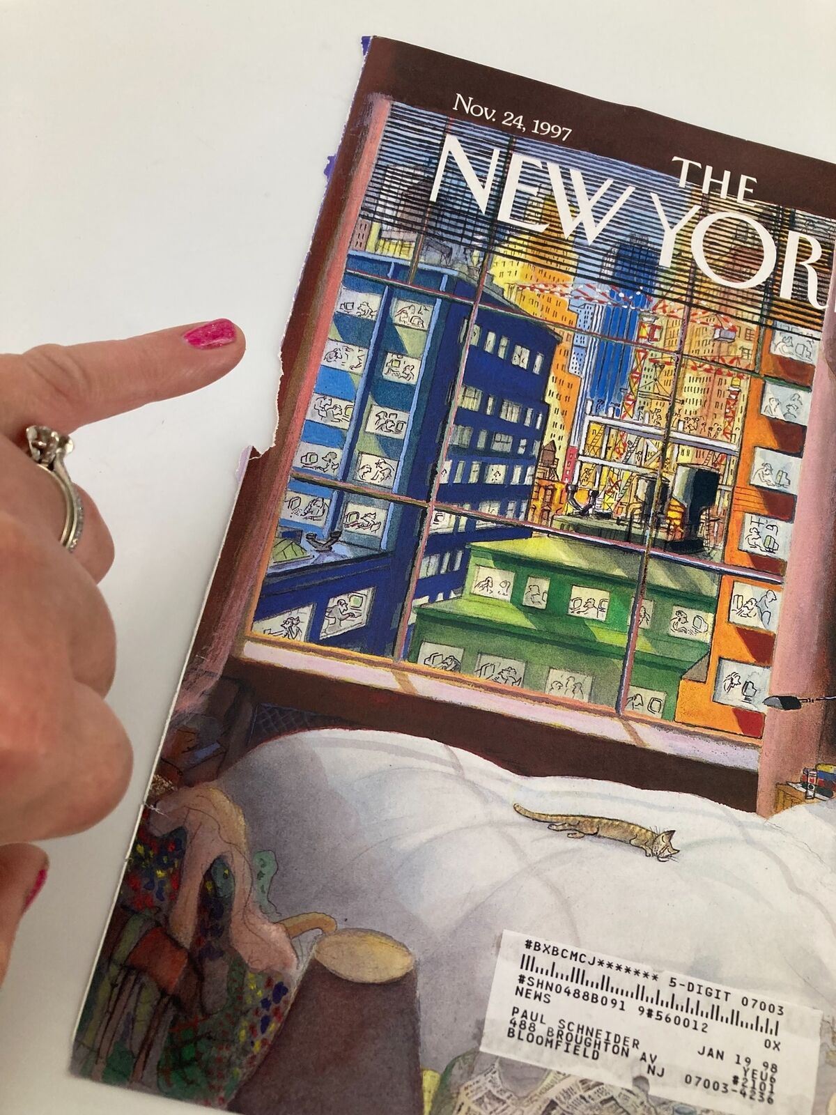 The New Yorker magazine cover, November 24, 1997, titled 'Luxurious Quiet Place' by J-J Sempe, showcasing an intricately designed bedroom and a hand pointing at the cover's details.