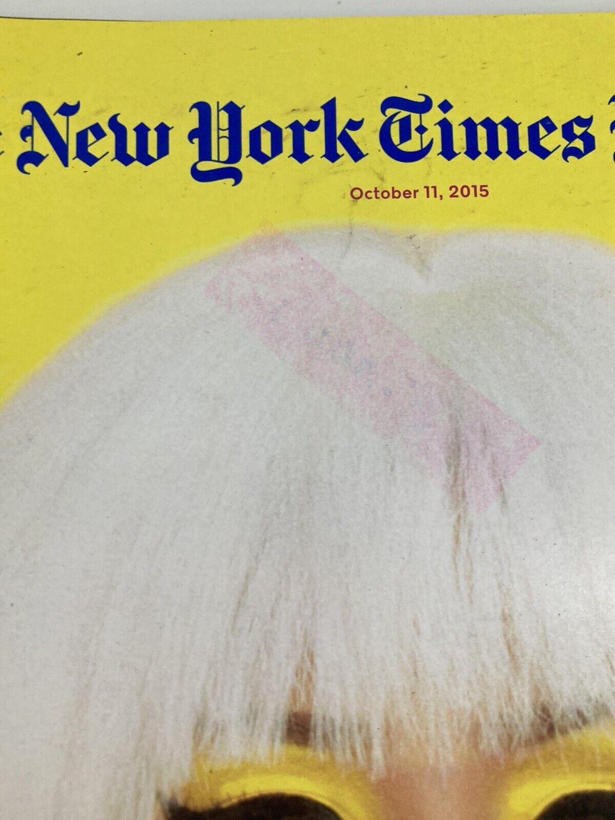 Cover of The New York Times Magazine, October 11, 2015, featuring bold colored background with a prominent graphic design and text.