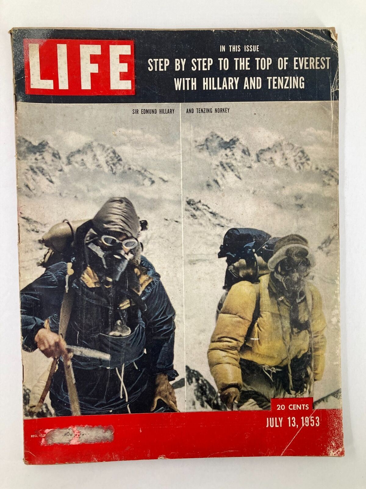 Vintage Life Magazine cover from July 13, 1953, featuring Sir Edmund Hillary and Tenzing Norgay. The cover highlights their legendary ascent of Mount Everest with captivating visuals.