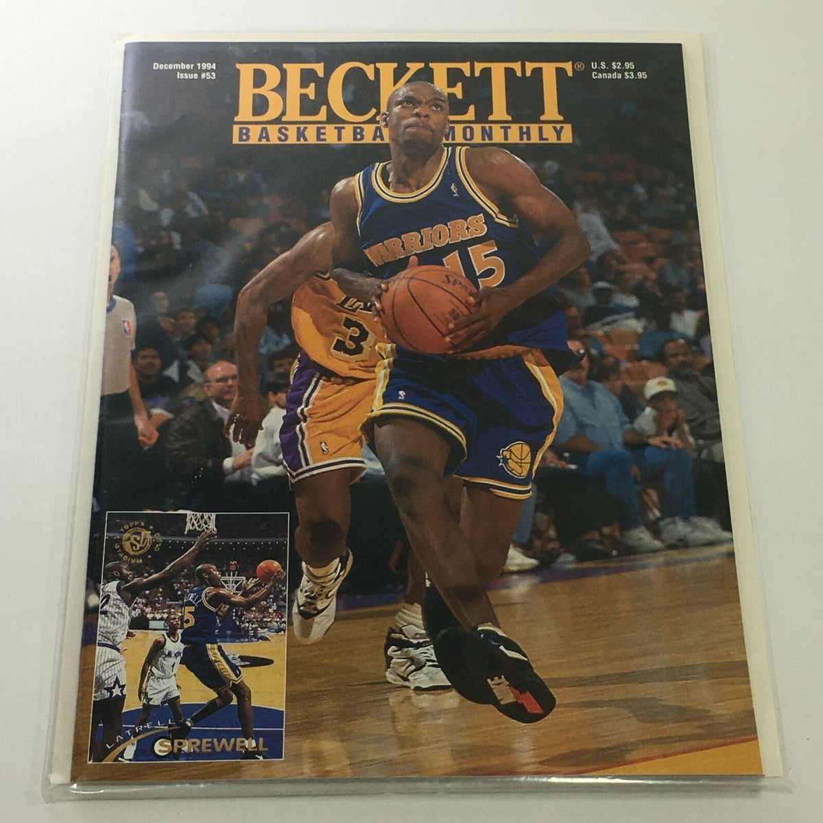 Beckett Basketball Monthly December 1994 Issue #53 featuring Warriors player Latrell Sprewell on the cover, showcasing basketball action, with vibrant colors and iconic imagery.
