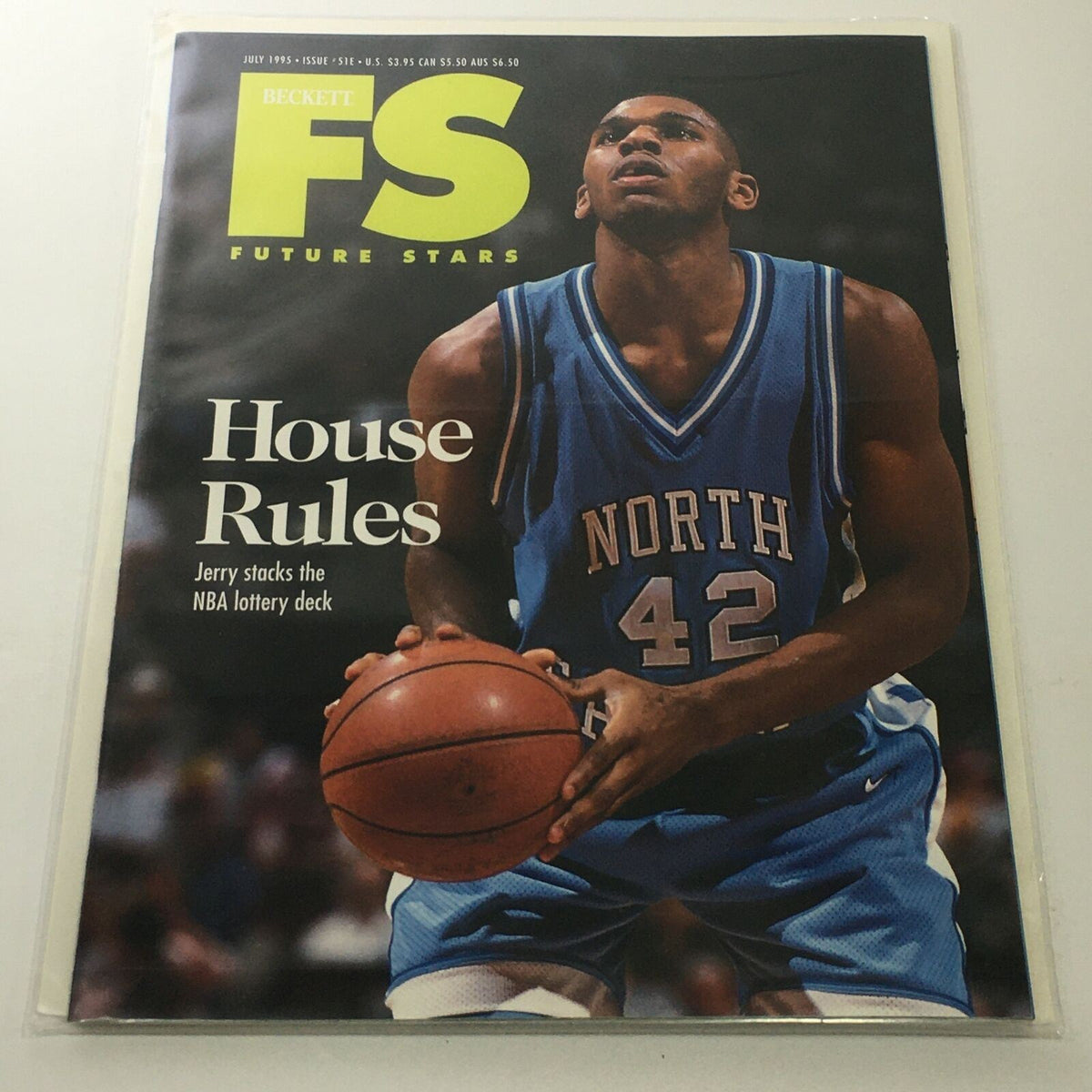 Beckett Future Stars: July 1995 Issue #S1E - Jerry Stackhouse House Rules magazine cover featuring a basketball player in a North jersey, holding a basketball, highlighting the NBA lottery deck.