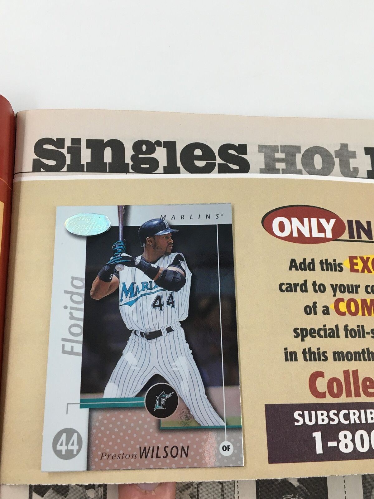 Beckett Baseball Card Monthly October 2002 showcasing a Preston Wilson baseball card from the Florida Marlins, featured in the Singles Hot section with visual highlights.