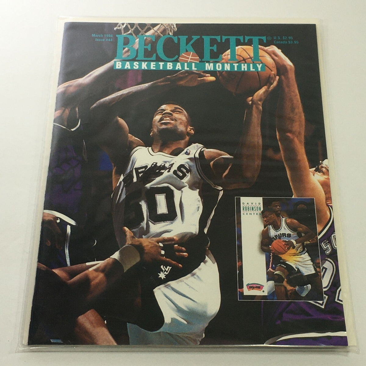 Cover of Beckett Basketball Monthly, March 1994 Issue #44 featuring David Robinson of the San Antonio Spurs, showcasing iconic basketball action.