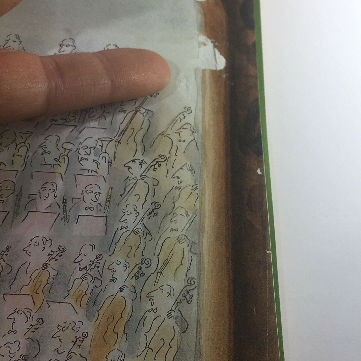 Close-up of the cover of The New Yorker April 14, 2008, showing details of the orchestra illustration by Jean-Jacques Sempé with visible tape.