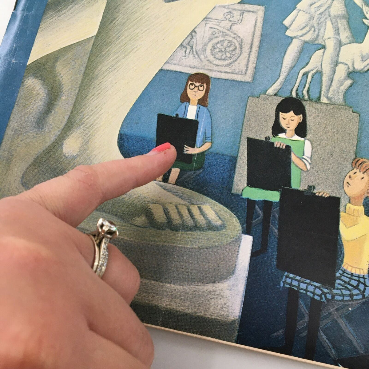 Detail of the cover from The New Yorker Full Magazine March 25 1961, showing art students sketching and a hand pointing at a statue.