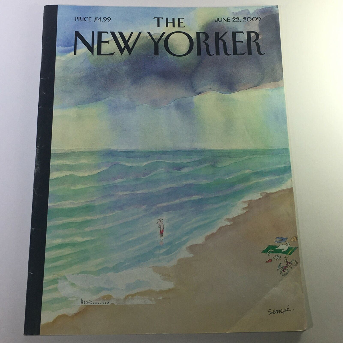 The New Yorker June 22 2009 cover featuring a serene beach scene with waves and a whimsical illustration by Jean-Jacques Sempé, reflecting the magazine's unique artistic style.