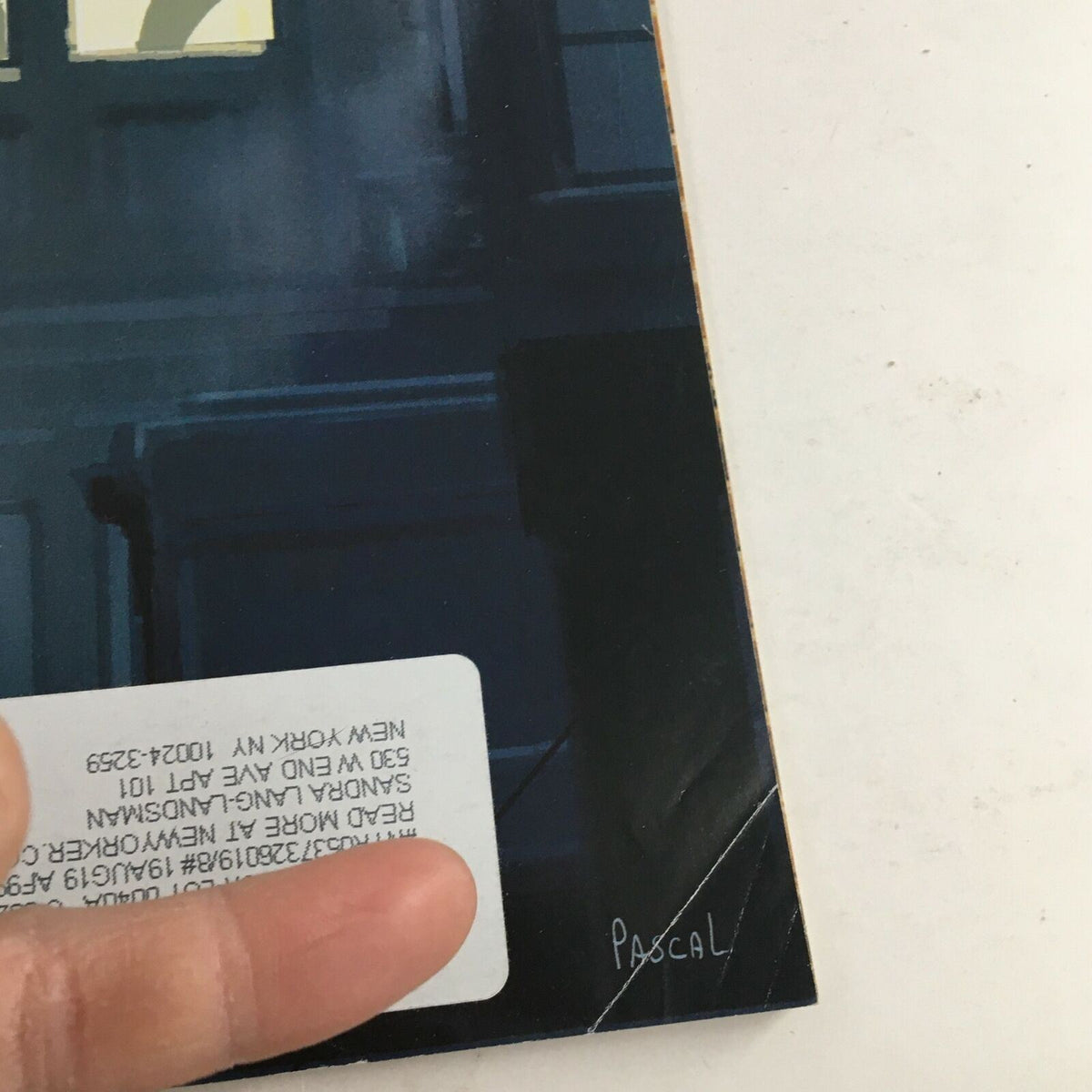 Close-up of the lower right corner of The New Yorker magazine February 11, 2019, showing the signature 'Pascal' from the cover art titled 'Love Interest'.