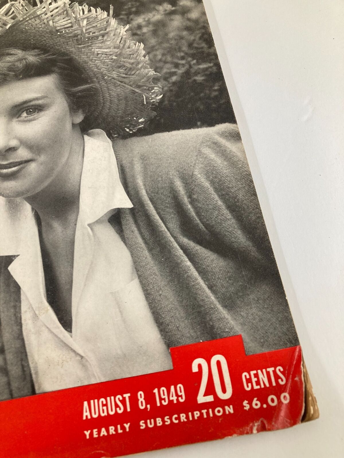 Close-up of VTG Life Magazine August 8 1949 cover showing a woman wearing a straw hat, featuring the date, price of 20 cents, and yearly subscription price of $6.00, highlighting vintage magazine details.