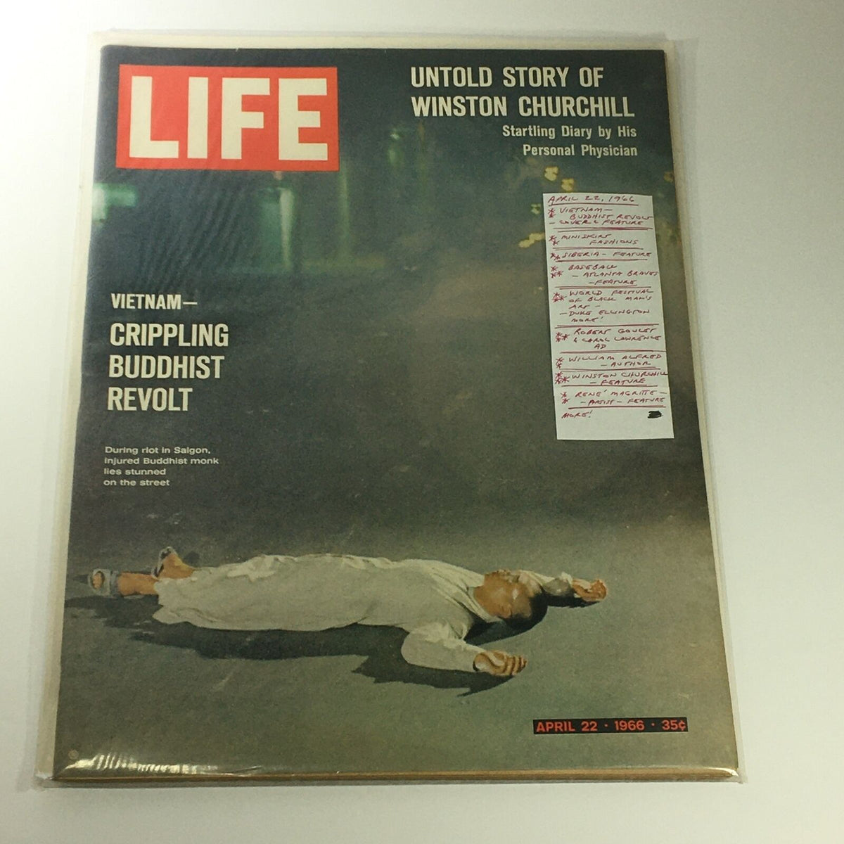 VTG Life Magazine April 22 1966 with notes, depicting the Vietnam Buddhist Revolt cover, illustrating an injured monk lying on the street.