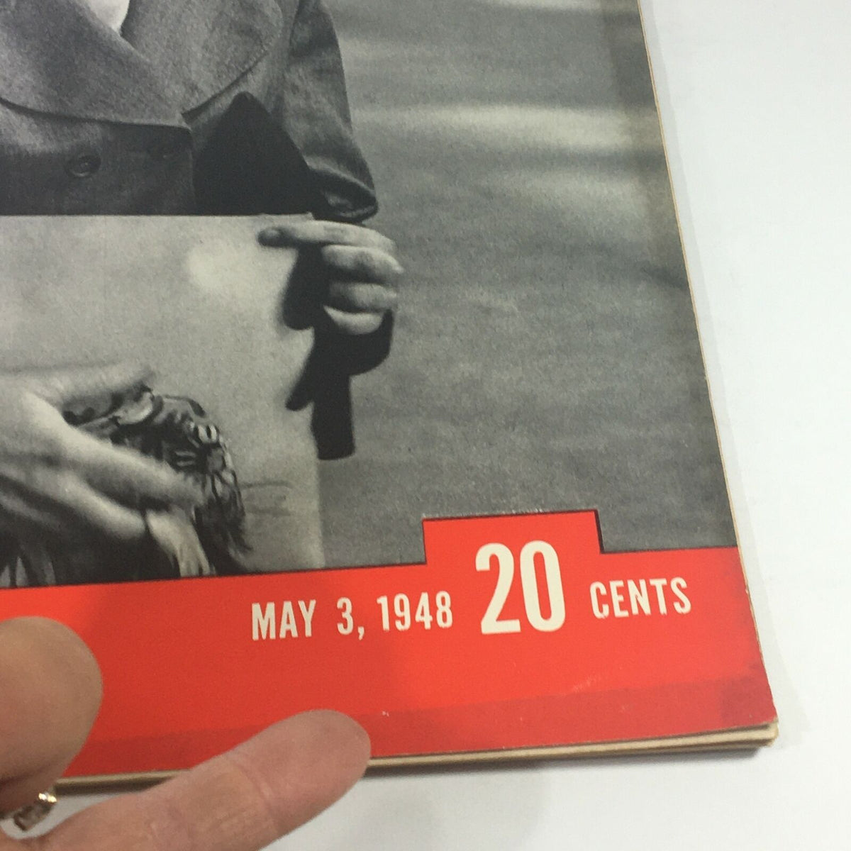 Close-up view of the VTG Life Magazine May 3 1948, showing the date and price on the corner of the cover, featuring the title 'Career Girl: Her Life & Problems.'