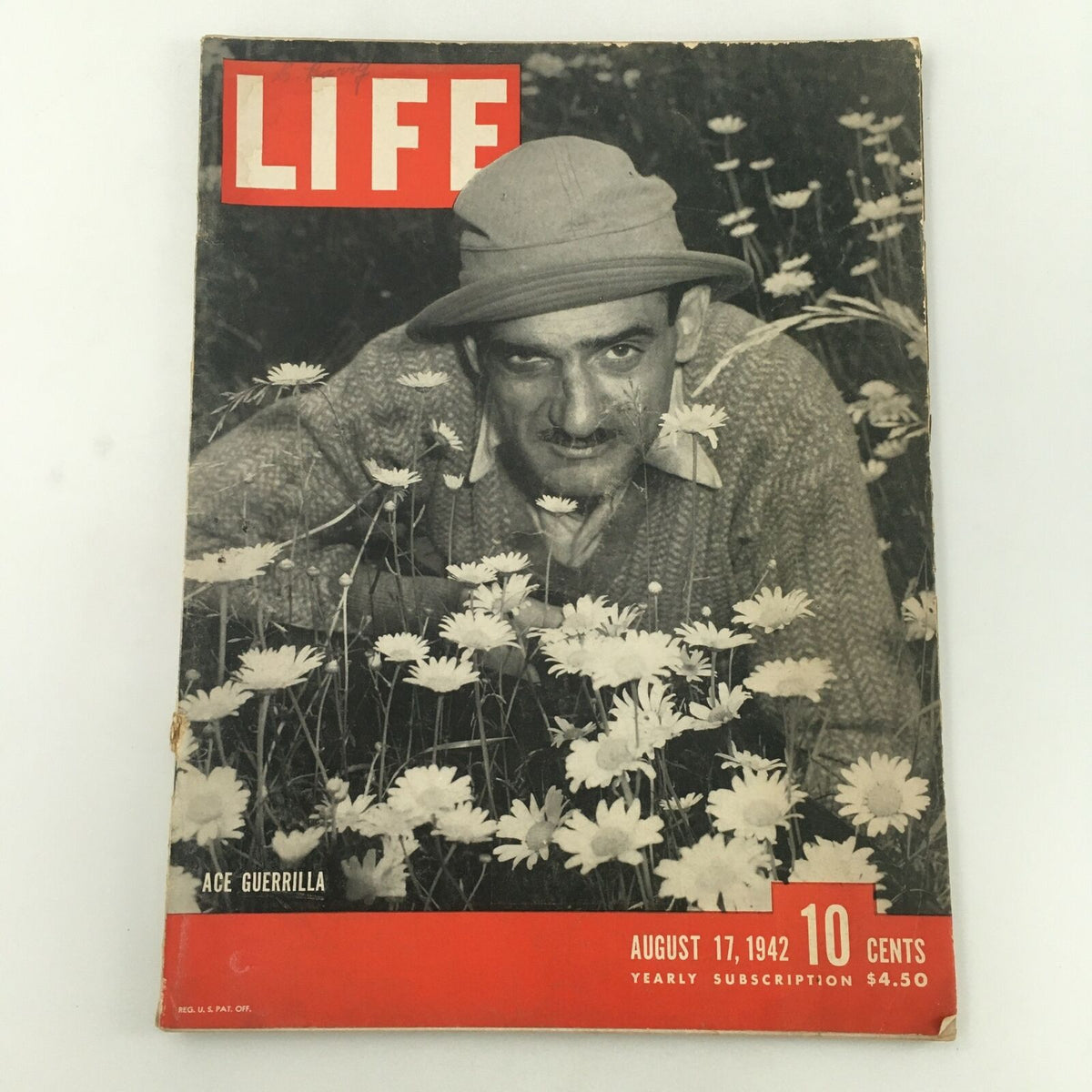 VTG Life Magazine August 17 1942 featuring Navy Ace and guerilla cover story, showcasing the vintage cover with flowers and a man in a hat, ideal for collectors and history enthusiasts.
