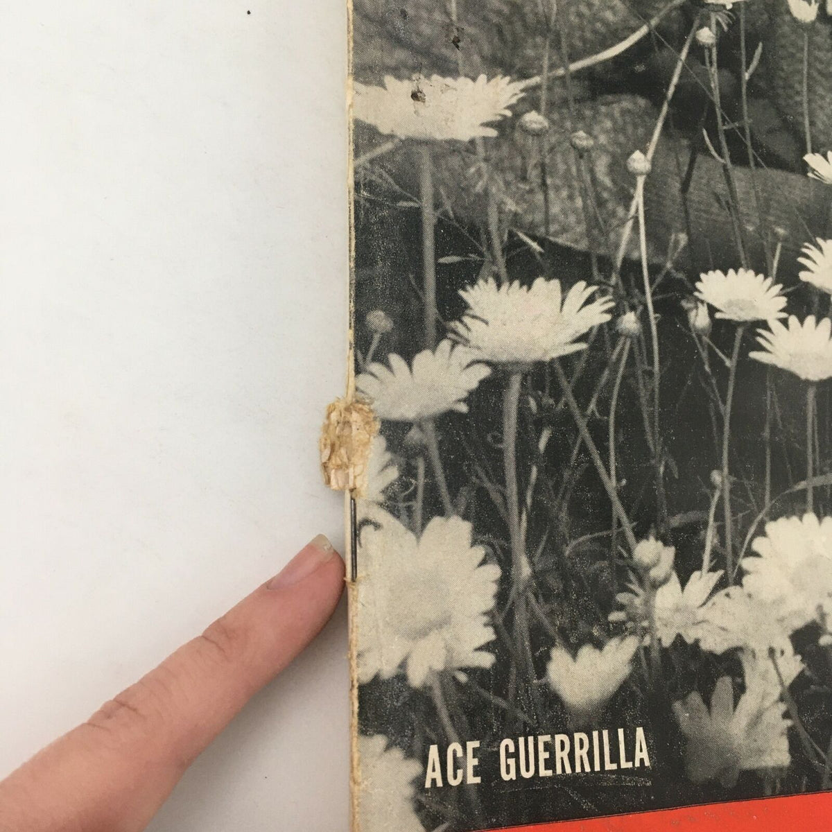 Close-up of the spine detail of the VTG Life Magazine August 17 1942, highlighting minor wear including a slight tear, emphasizing the vintage appeal for collectors.