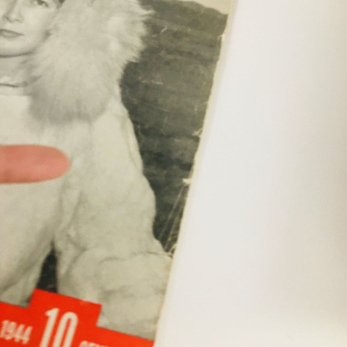Close-up of the cover of VTG Life Magazine January 3 1944, highlighting the woman's attire and the magazine's vintage details.