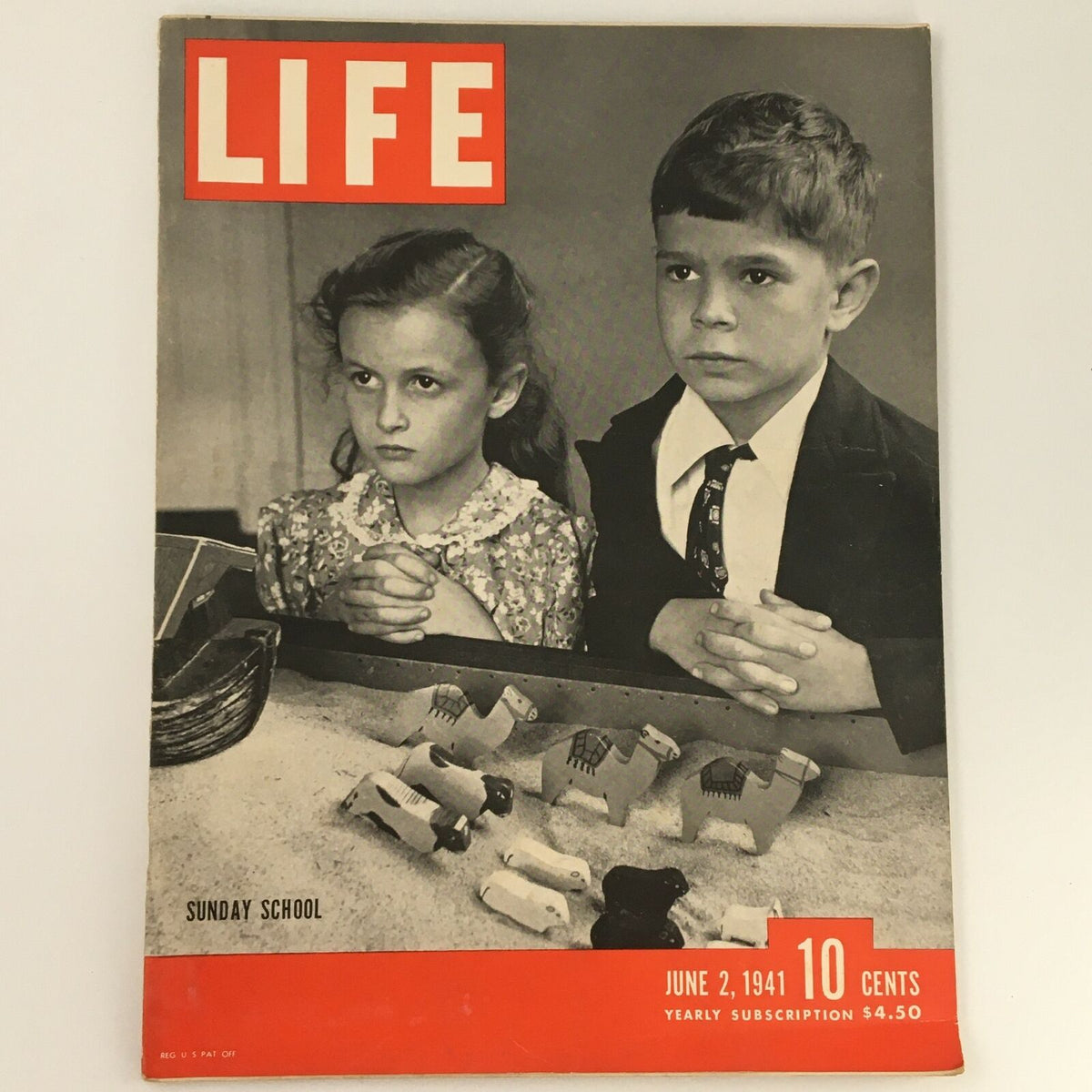 Vintage Life Magazine dated June 2, 1941 featuring a cover image of children in Sunday School. The magazine showcases a nostalgic moment with two children praying and wooden toy animals in the foreground, making it a perfect collectible for vintage magazine enthusiasts.
