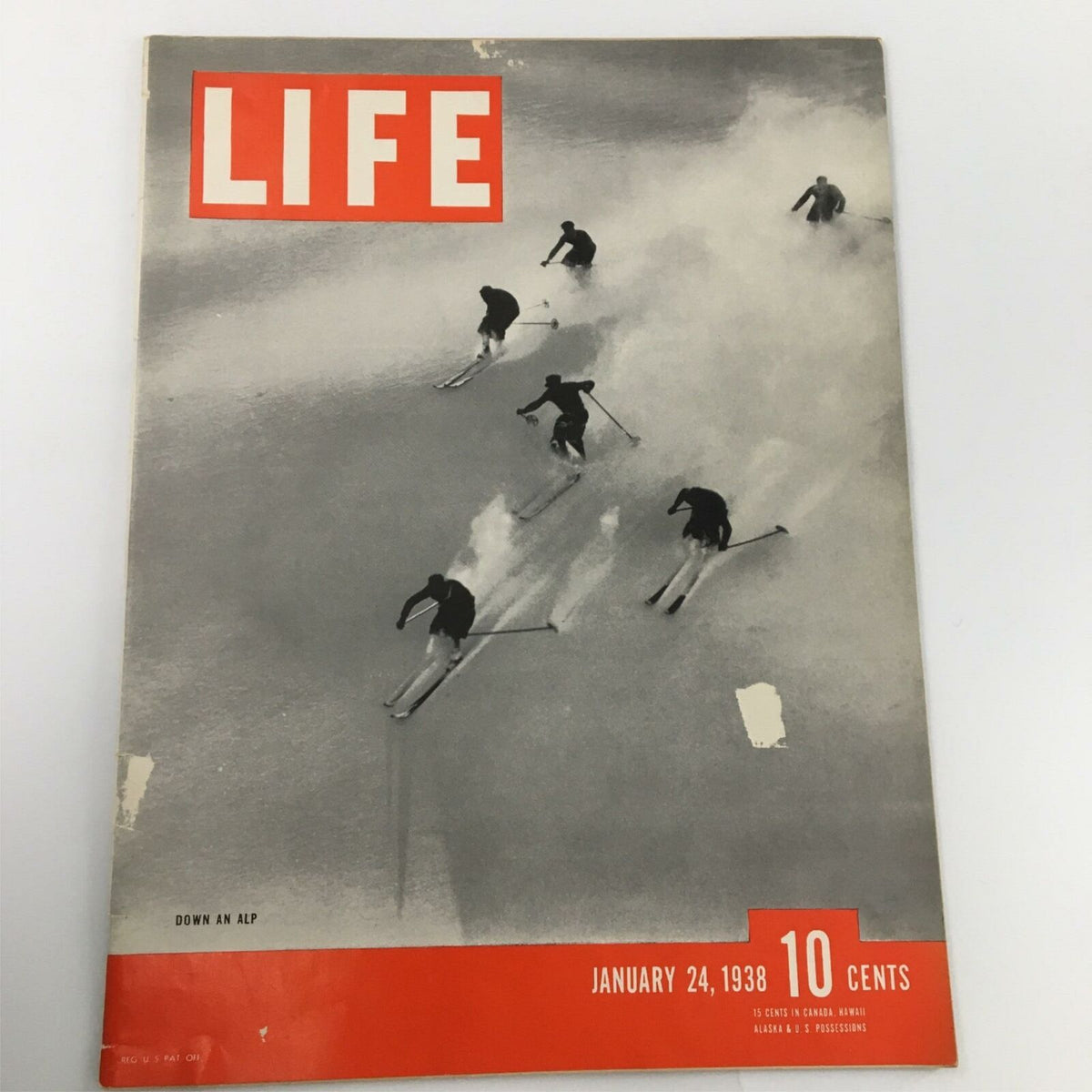 Cover of VTG Life Magazine January 24 1938 featuring skiers descending the snowy Alps, capturing the essence of skiing culture in the late 1930s.