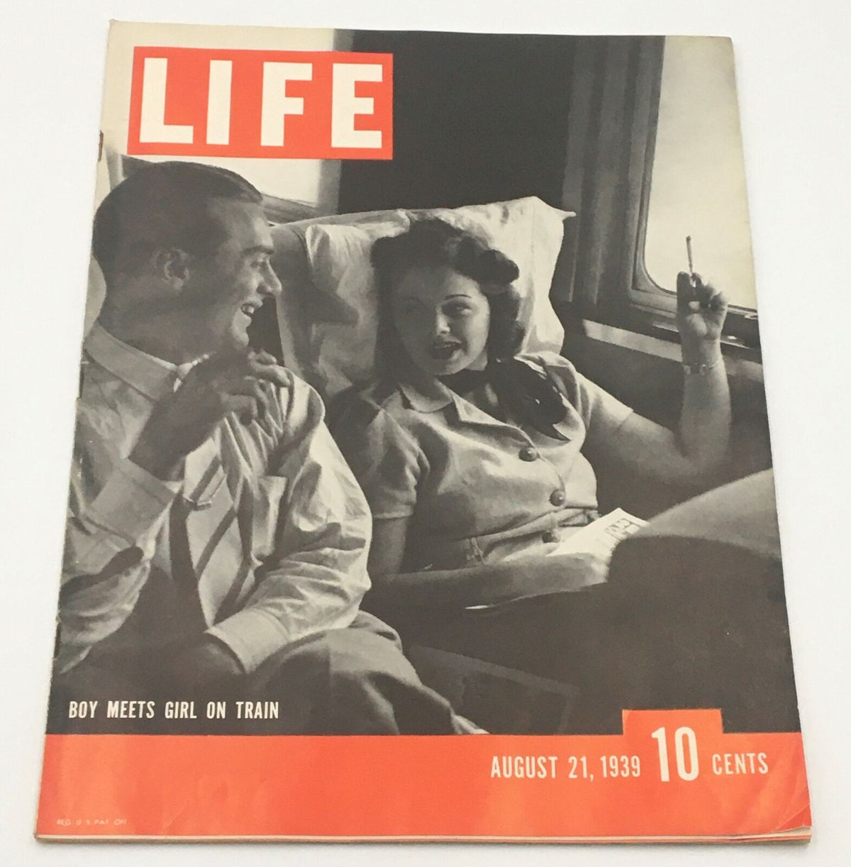 VTG Life Magazine August 21, 1939 featuring the cover 'Boy Meets Girl On Train' with a charming illustration of a couple on a train.