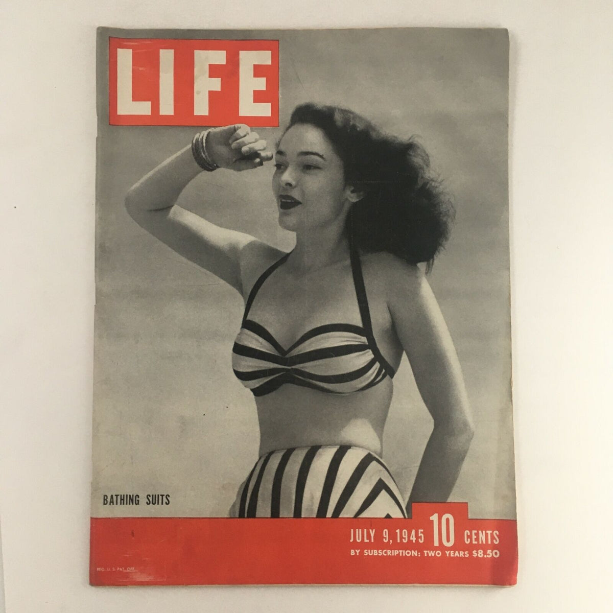 Life Magazine July 9, 1945 featuring Paddy Ellerton modeling in a striped bathing suit on the cover, showcasing 1940s fashion and style.