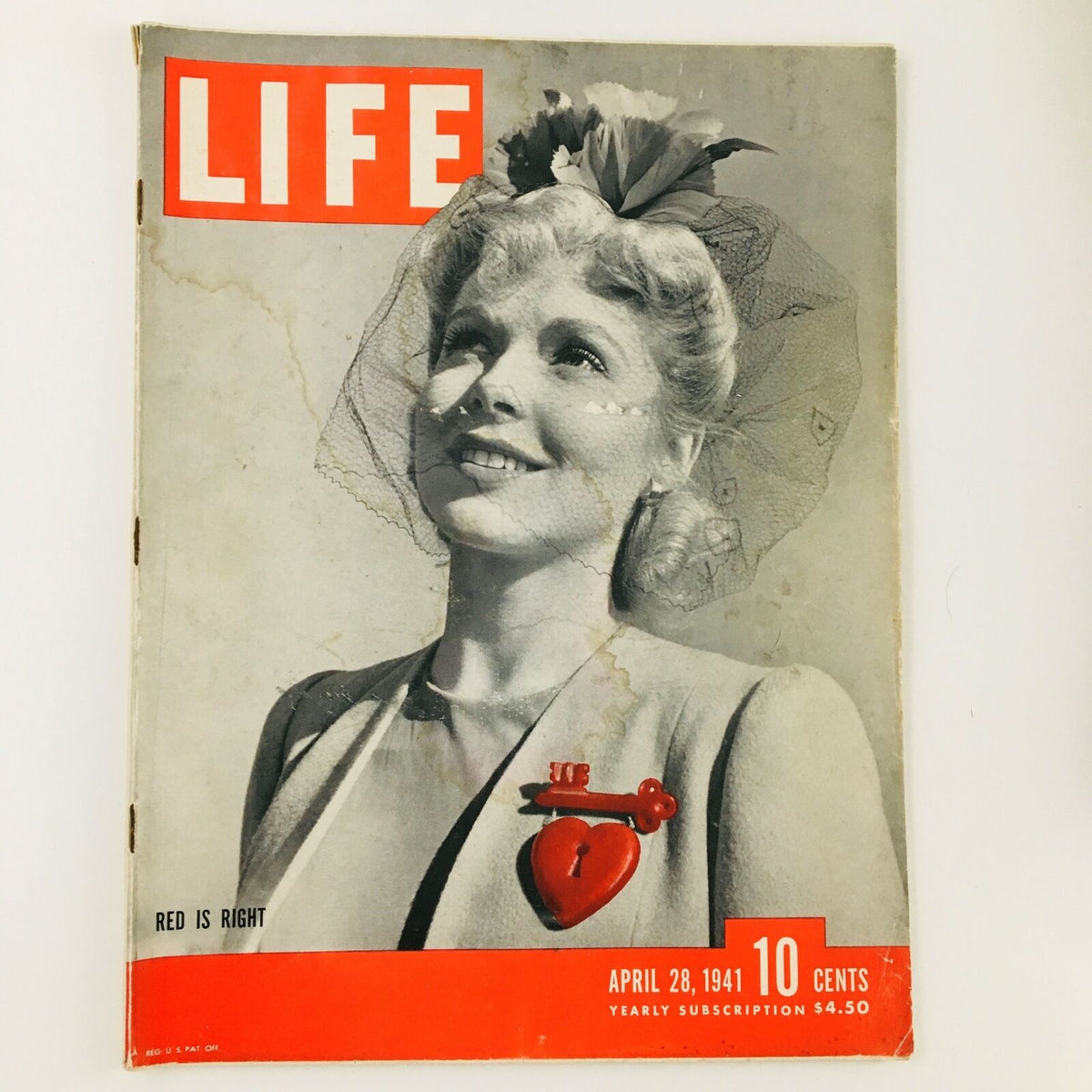 Cover of VTG Life Magazine April 28 1941 featuring a smiling woman in a veil, highlighting the theme 'The Red is Always Right'.