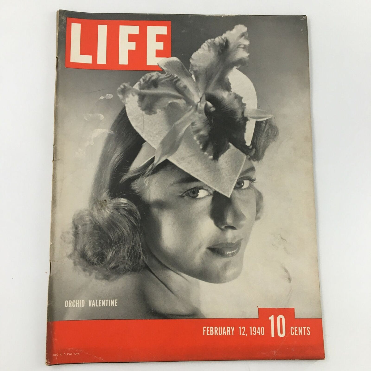 Vintage Life Magazine February 12 1940 cover featuring an Orchid Valentine theme, showcasing a woman with a decorative headpiece.