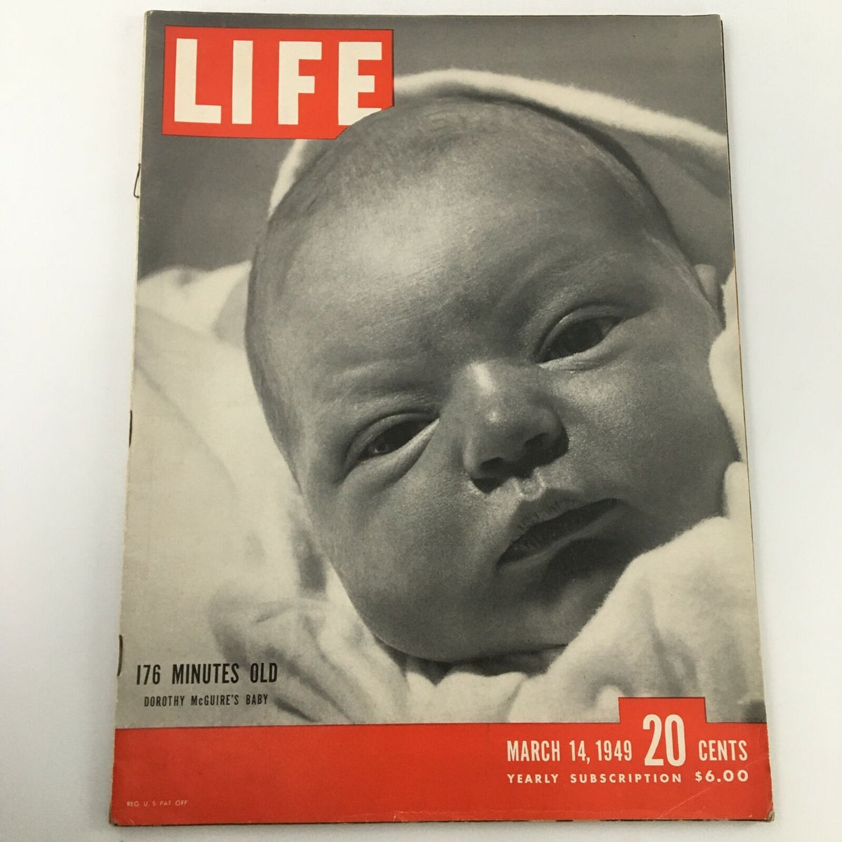 VTG Life Magazine March 14 1949 featuring a cover image of a baby with the text '176 Minutes Old' and 'Dorothy McGuire's Baby', showcasing mid-20th century culture.
