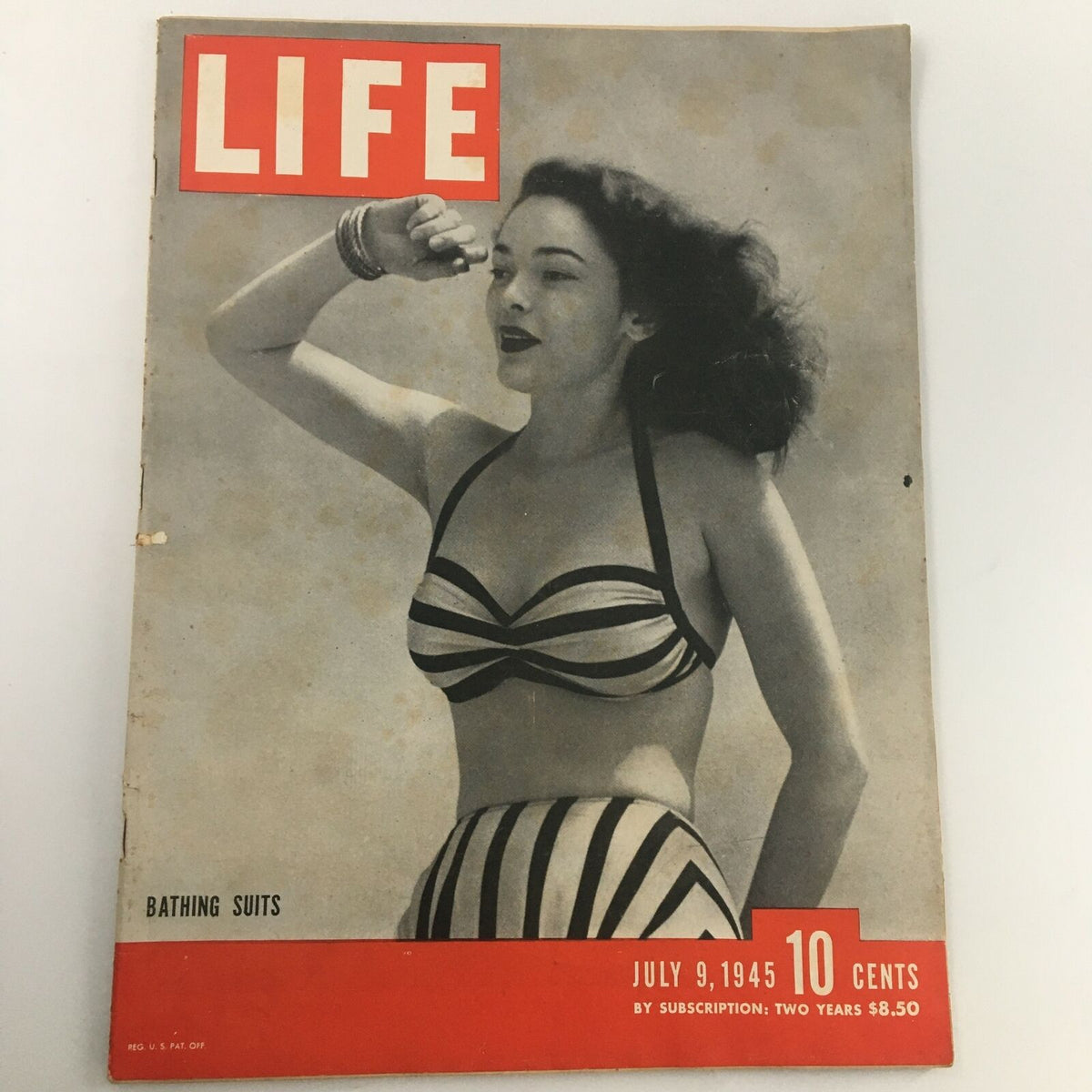 VTG Life Magazine July 9 1945 featuring a cover image of a woman in a striped bathing suit, showcasing vintage swimwear fashion and the cultural evolution of bathing suits post-World War II.