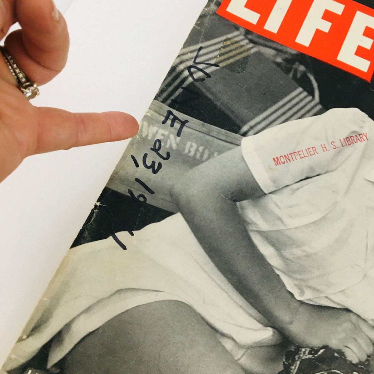 Close-up view of the cover of 'VTG Life Magazine June 23 1941' highlighting the handwritten library mark and the title 'Lazy Fishing'.