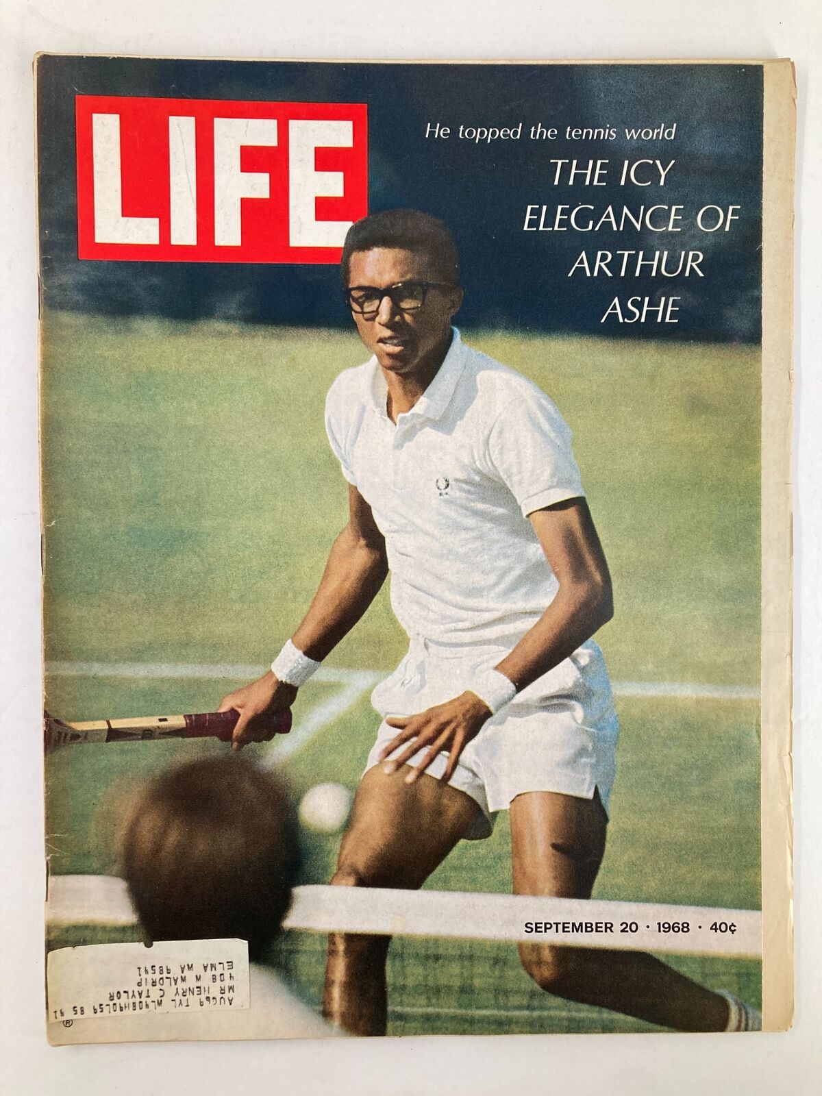 Cover of Life Magazine from September 20, 1968 featuring the iconic tennis star Arthur Ashe, highlighted under the title 'The Icy Elegance of Arthur Ashe'. The image showcases Ashe playing tennis, wearing a white polo shirt and glasses, capturing a significant moment in sports history.