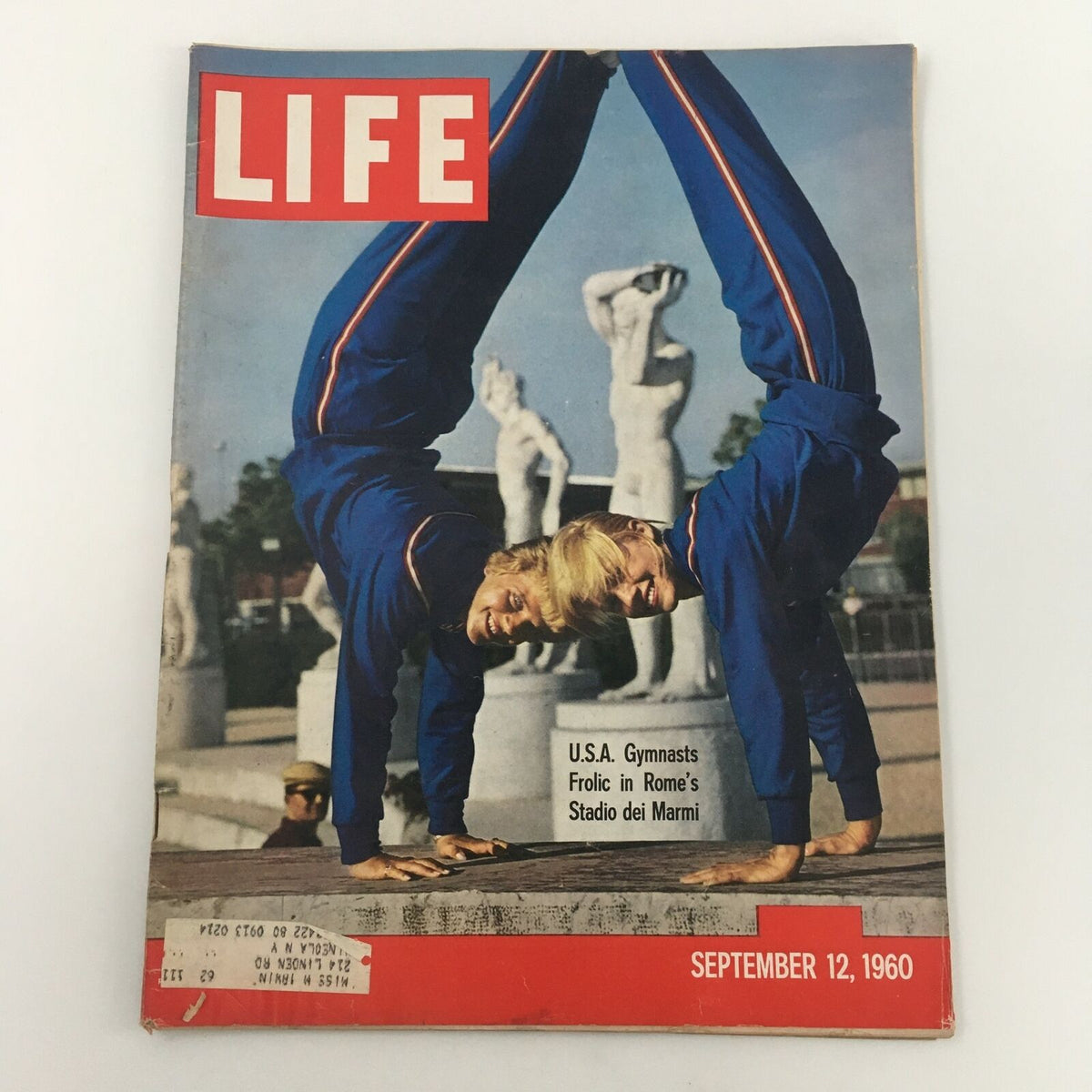 VTG Life Magazine Cover from September 12, 1960, featuring Team U.S.A. gymnasts frolicking at Rome's Stadio dei Marmi, showcasing the vibrant spirit of the Olympic Games.