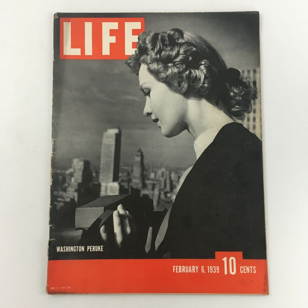 VTG Life Magazine February 6 1939 Washington Peruke Feature featuring a stylish woman on the cover, set against a backdrop of a city skyline, highlighting the fashion and culture of the era.