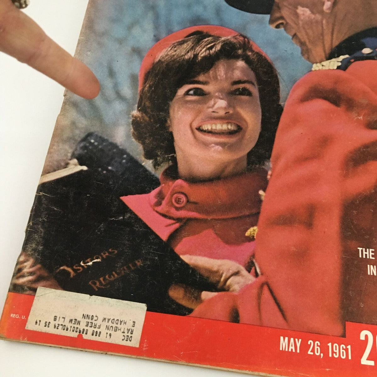 Cover of VTG Life Magazine May 26 1961 featuring a smiling woman in a red coat and hat, depicting Jacqueline Kennedy during her visit to Canada, showcasing historical elements of the era.