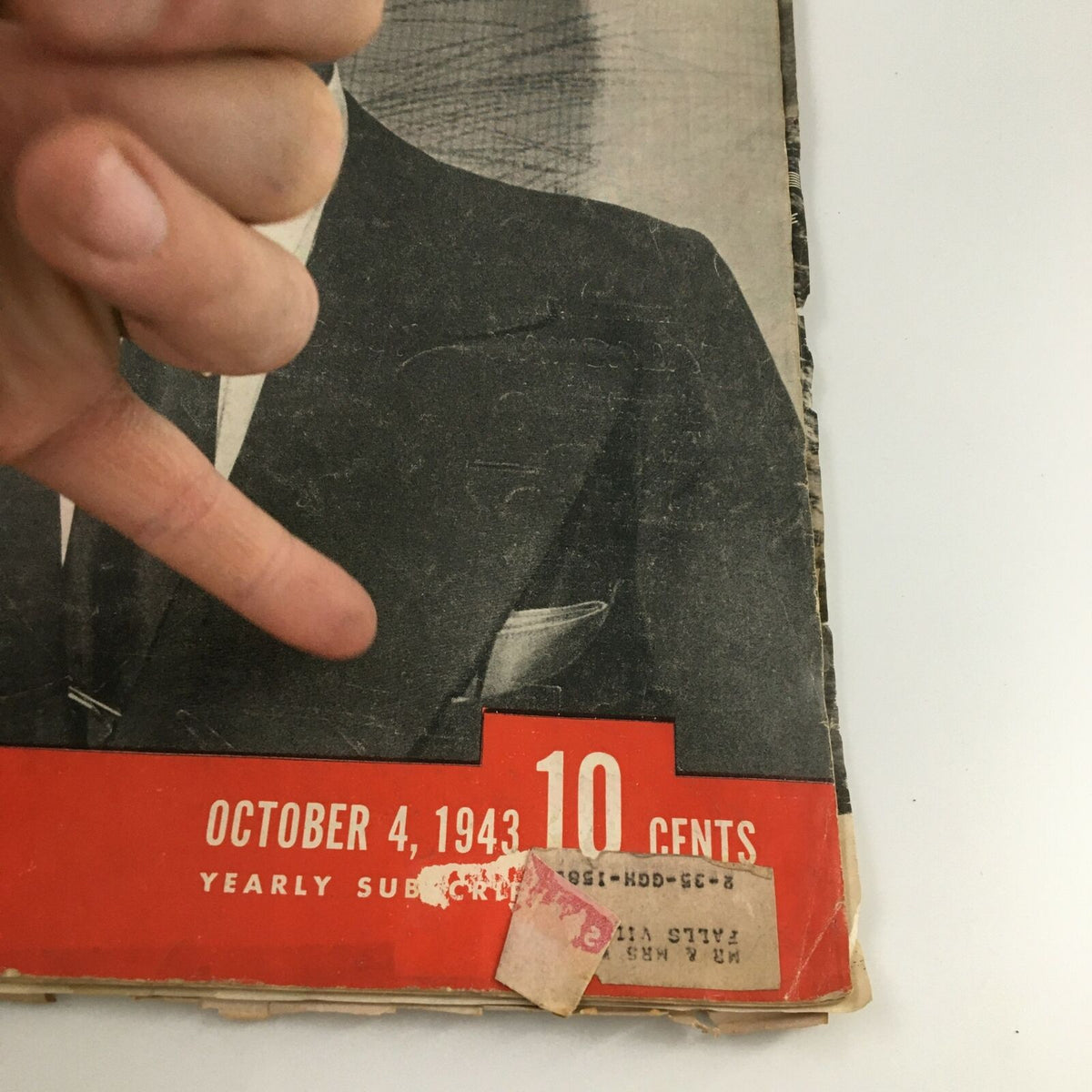 Bottom section of the VTG Life Magazine cover from October 4, 1943. This view displays the publication date and price, along with a sticker, reflecting its collectible nature.