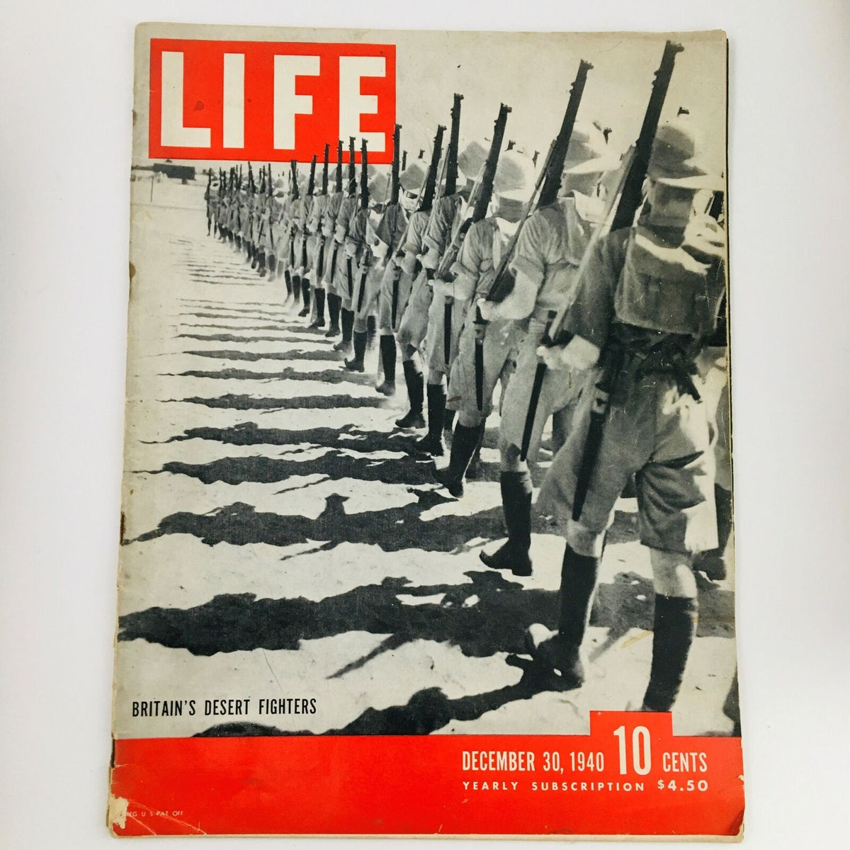 Cover of Vintage Life Magazine, December 30, 1940, featuring Britain's Desert Fighters, showcasing soldiers on parade in a historical World War II context.