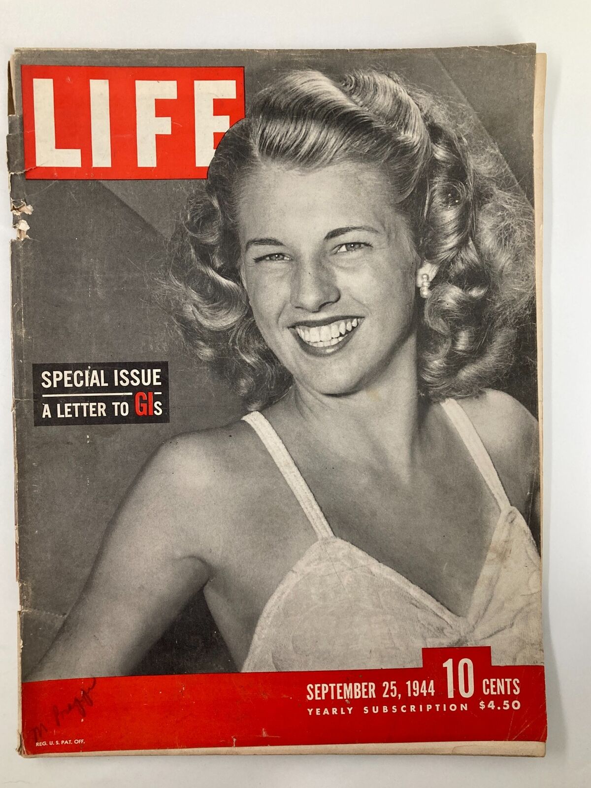 Cover of VTG Life Magazine September 25 1944 Special Issue A Letter to GIs featuring a smiling woman with curly hair.