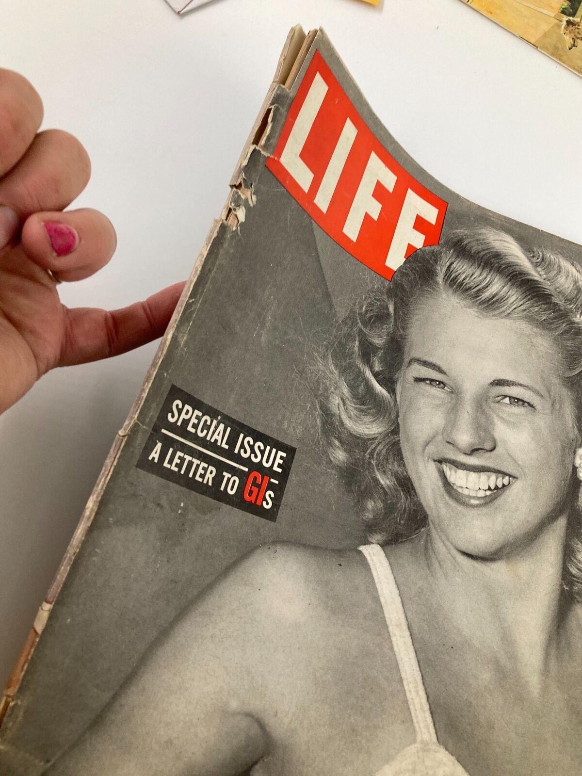 Side view of VTG Life Magazine September 25 1944 Special Issue A Letter to GIs, highlighting the worn binding and special issue label.