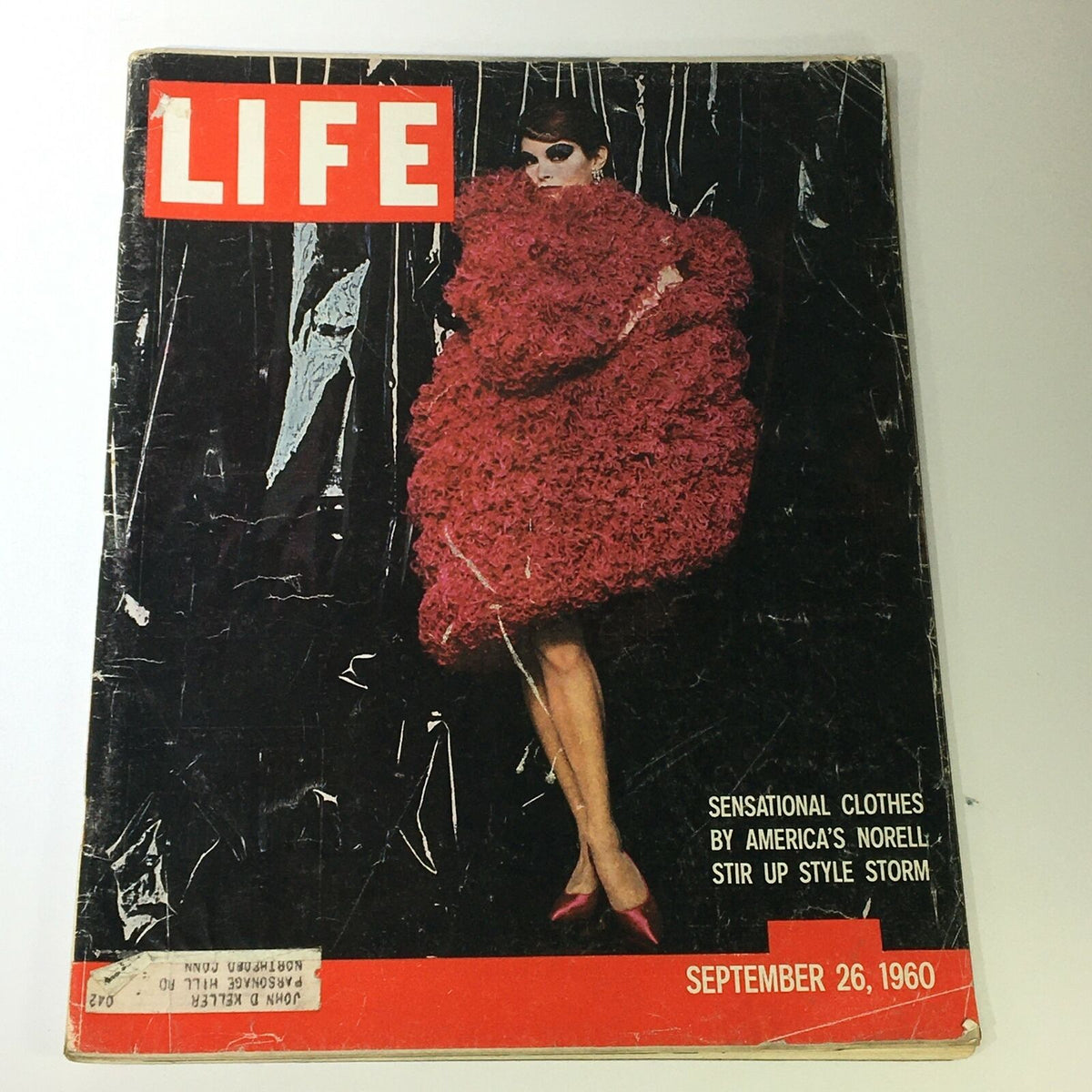 Cover of VTG Life Magazine from September 26, 1960 featuring a fashion model wearing a dramatic red fur coat, highlighting America's Norell.