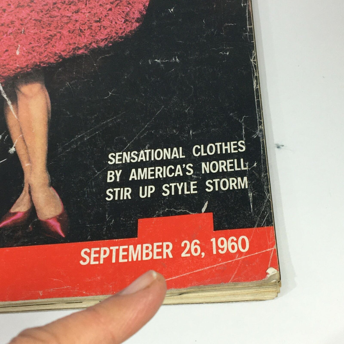 Close-up of VTG Life Magazine cover from September 26, 1960, showcasing the text with details about sensational clothes by America's Norell.