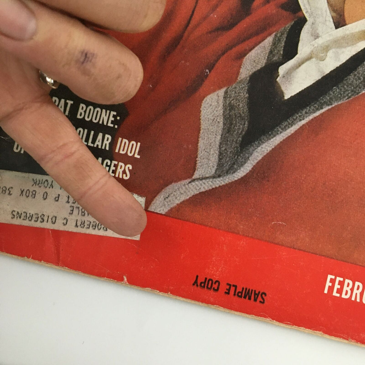 Detailed view of the VTG Life Magazine February 2, 1959 cover, focusing on the lower section which displays Pat Boone's feature as 'Million-Dollar Idol of U.S. Teen-Agers' along with a sample copy label.